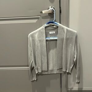 Calvin Klein silver sparkle shrug size large worn once
